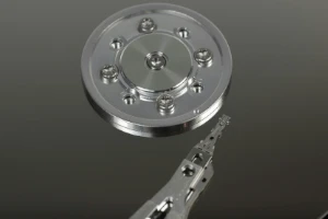 Macro photo of hard drives in a server environment for professional IT storage support.