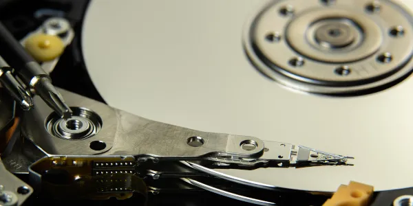 A picture reflecting a hard drive for representation of online backup.