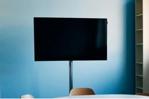 Mounted display monitor for visual communication in lobbies and meeting rooms.