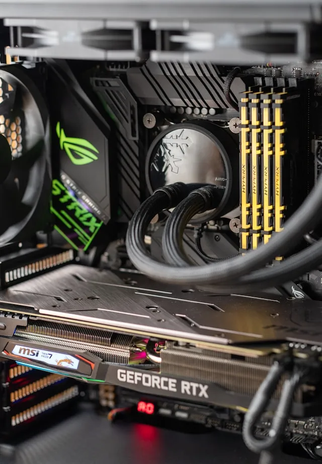 Picture of a PC build close up showing a video card and other PC information.