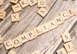 Compliance icon with spelled out letters.