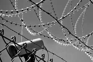 An Image depicting a security camera in a highly secure area to reflect security.